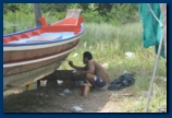 Local Painting his Boat