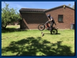 Noddy pulling a small wheelie